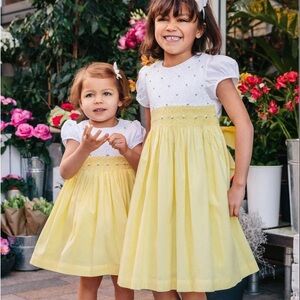 Trotters London Smocked Lemon and Rose dress (size 2)